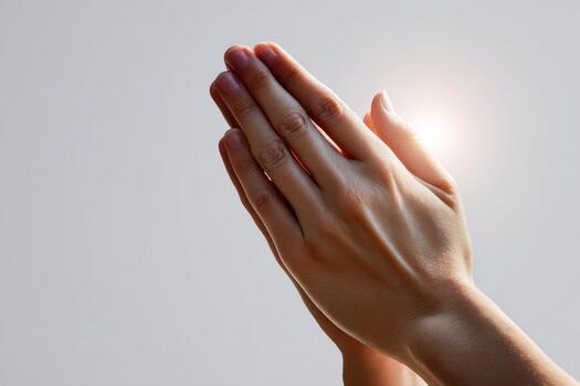 silueta de un soltero Orando mano en contra un suave degradado fondo, simbolizando espiritualidad, esperanza, y reflexión, con Copiar espacio para texto o diseño foto