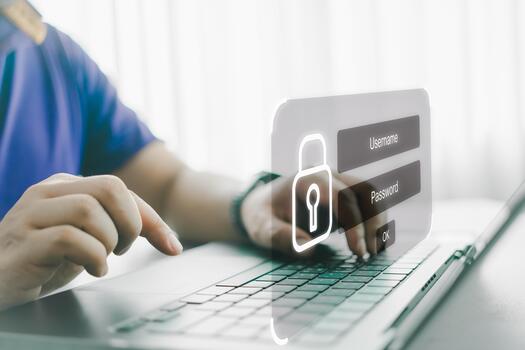 User typing login and password at home, secure access to the personal information and big data. cyber security. photo