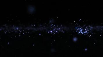deslumbrante cósmico poeira partículas cintilar e flutuador dentro uma Sombrio vazio, criando uma hipnotizante e etéreo efeito perfeito para movimento gráficos video