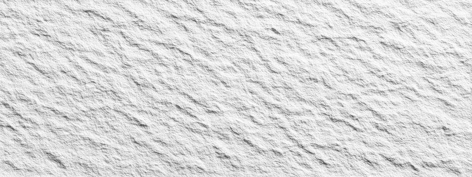 Bumpy, white, textured surface with subtle, diagonal lines photo