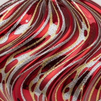 Abstract swirling pattern of red gold and white with a glittering texture photo