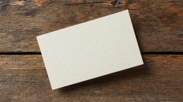 Blank Textured Paper On Rustic Wooden Background. Ideal For Branding, Invitations, Or Stationery Design photo