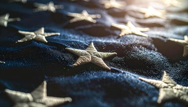 Starfish on a dark blue textured surface. photo