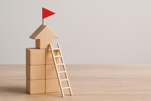 Wooden blocks stacked with arrow shape and red flag symbolizing leadership and team management with ladder on wooden surface and neutral background photo