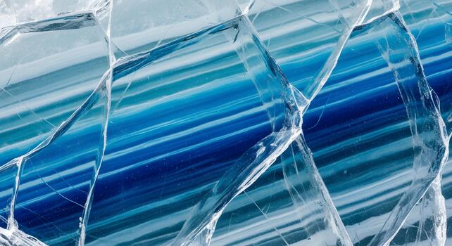Striking blue and white layers of a fractured polar ice block creating a stunning natural abstract texture photo