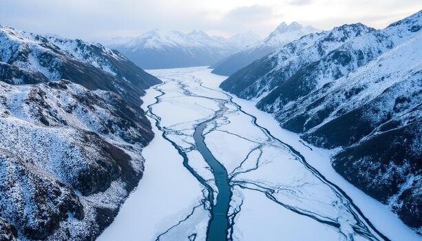 A unique viewpoint of the river system creating a fascinating abstract composition on the cold winter ground photo