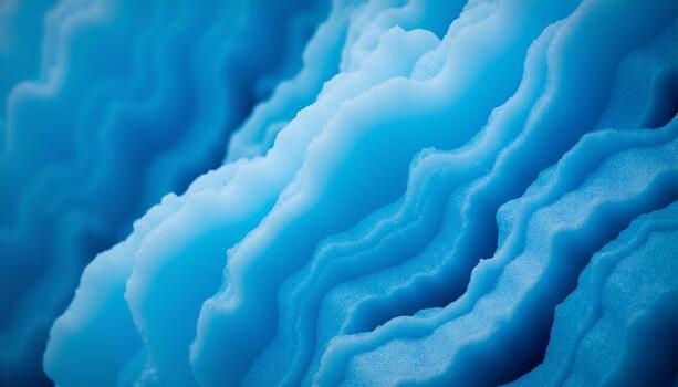 An interesting texture shot with deep shadows within the ice and light reflecting off the frozen irregular surface photo