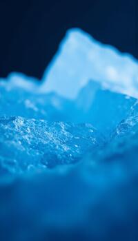 Abstract pattern of the fractured ice mass with vertical lines and varying shades of deep and light blue photo