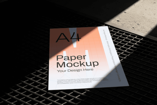 a4 carta modello visualizzato su buio metallo grattugiare con duro luce del sole la creazione di alto contrasto ombra e leggero le zone con bianca sfondo superficie su superiore nel ancora vita vicino su concetto psd