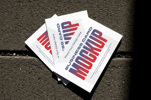 vicino su di impilati bianca attività commerciale carte con rosso e blu pendenza testo modello su strutturato buio sfondo su soleggiato giorno per il branding immagini con pulito grafico design psd