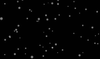 Isolated snow falling on black background video