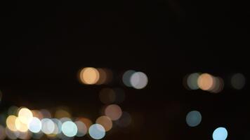 Sparkler glow in the dark with festive lights and colorful bokeh effect in nighttime celebration, creating a magical and vibrant atmosphere of joy video
