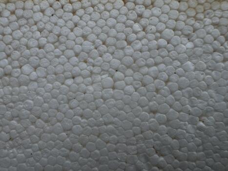 Close-Up View of Expanded Polystyrene Granular Surface Creating a Unique Cellular Pattern photo