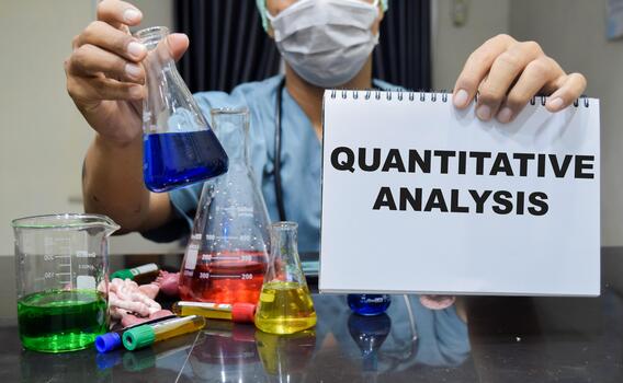 A laboratory technician conducting quantitative data analysis in a lab. scientific research concept photo