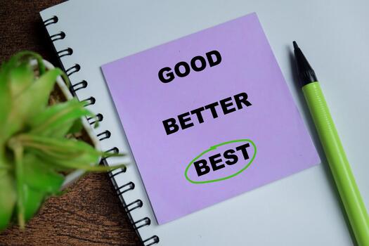 Concept of red circle best circle write on sticky notes isolated on Wooden Table. photo