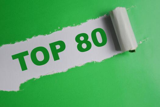Top 80 Text written in torn paper. highlight lists, placement, milestones and achievements photo