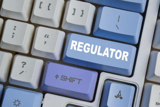 Regulator - device that controls or limits something sets standards button on the keyboard photo