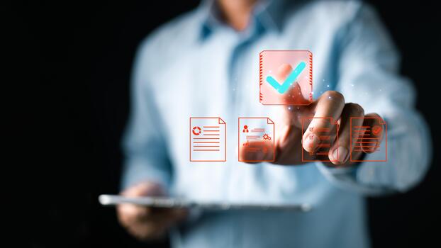 A person interacts with a digital interface featuring floating icons of documents, charts, and a large checkmark, symbolizing document, digital, approve processes in a modern paperless workflow. photo