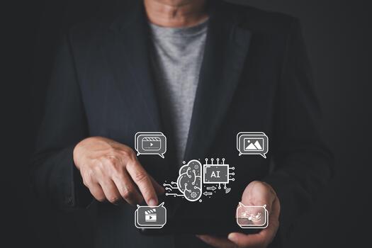 A person in a suit uses a digital tablet with floating icons representing AI, content creation, use, research, and analysis, symbolizing smart media generation through artificial intelligence. photo