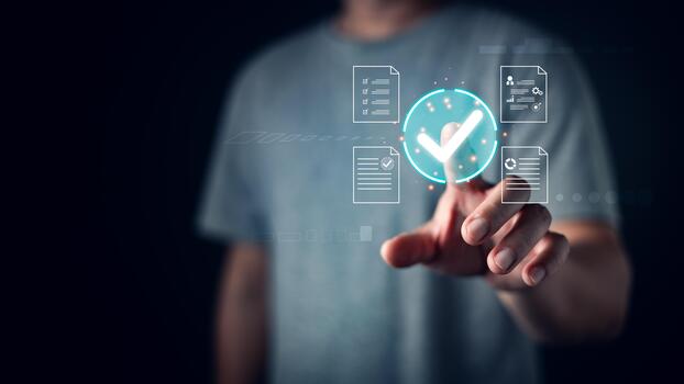 A person in a gray shirt taps a glowing digital checkmark by document icons, symbolizing approval, task completion, data verification, and efficient digital workflow management. photo