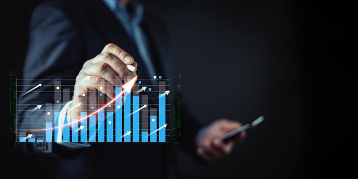 A businessman interacts with a digital graph showing rising bar charts and upward arrows, symbolizing financial growth, business success, data analysis, and increasing performance metrics. photo