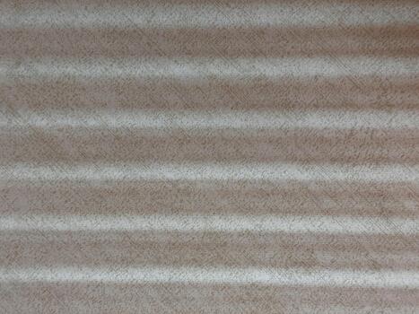 Macro view of soft textured fabric with subtle horizontal stripes and neutral tones, minimal textile background for design, product mockups and pattern studies. photo