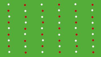 Colorful Christmas pattern with red and white dots on a green background video