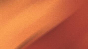 en vibrerande abstrakt bakgrund terar en slät diagonal lutning av värma orange och röd toner med en subtil kornig filma textur effekt video