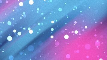 mjuk fokus glitter partiklar flytande över en vibrerande diagonal lutning av blå och rosa med en subtil texturerad täcka över för en magisk effekt video