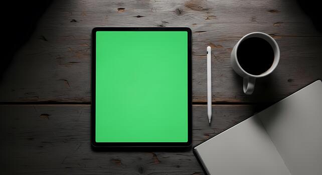 Modern Tablet Displaying Green Color Code with Digital Pen Coffee and Notebook on Rustic Wooden Desk Creative Workspace photo