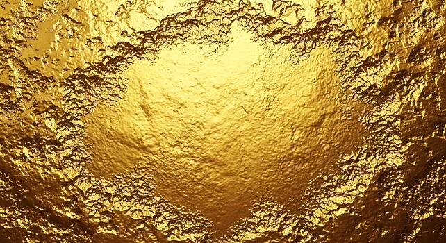 Textured golden surface with light reflections metallic background photo