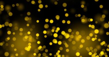 gyllene bokeh ljus bakgrund med gnistrande partiklar på svart, abstrakt lyx glitter design för firande och festlig tema. slinga animering video
