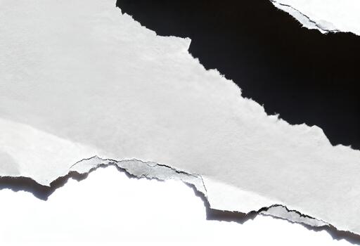 A piece of paper with a hole in it photo