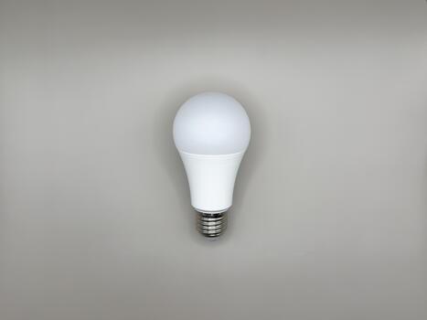 Modern LED lamp, saving electricity. Tungsten light bulb lamp. Non-working light bulb, broken light bulb. Concept of light and dark, idea, electricity copy space, flay lay, top view gray background photo