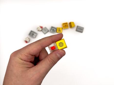 Red switches, Keyboard repair, broken keys, mechanical keyboard, red keycaps, keyboard work advertising, white background, copy space photo