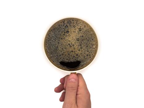 A cup of coffee. View from above. Isolated on white background. Flatlay Top view, copy space. photo