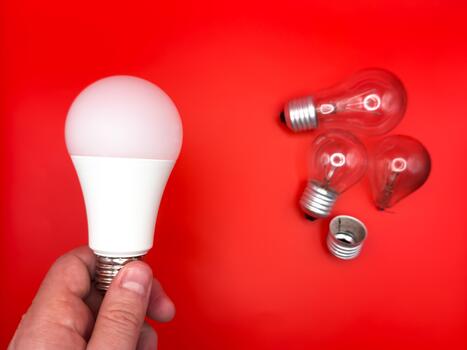 Modern LED lamp, saving electricity. Tungsten light bulb lamp. Non-working light bulb, broken light bulb. Concept of light photo