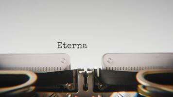 Old mechanical typewriter typing Eternal Questions in a close up view, with metal letters striking the white paper. video