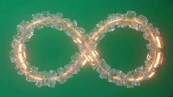 Mesmerizing infinity loop rendered with glowing crystal shards and golden light video