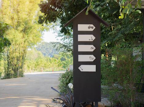 Wooden signs with blank text. A board of pointers with a direction guide in the form of arrows. photo