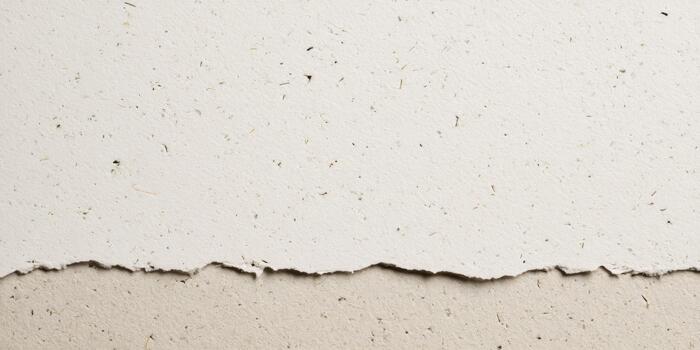 Torn paper texture showing natural fibers and layers photo