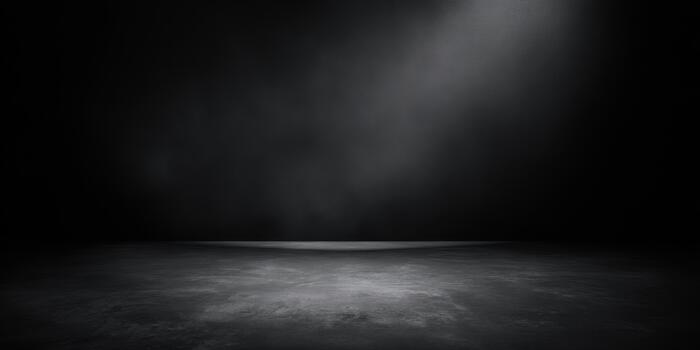 Stage area with dramatic lighting in a dark setting photo