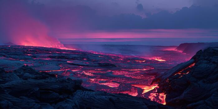 Lava flows illuminate the landscape during sunset in Hawaii photo