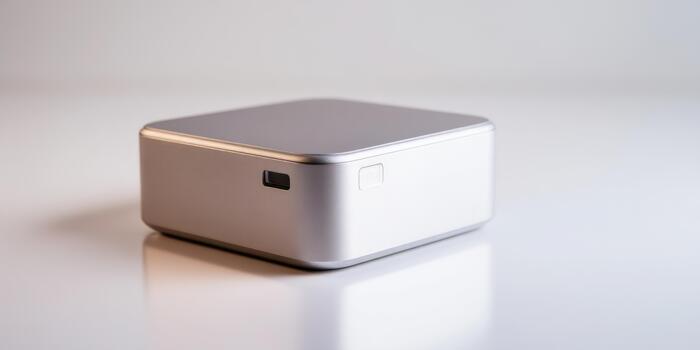 Compact technology device on a clean surface photo