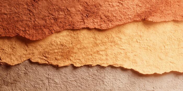 Natural textured paper layers in warm colors photo