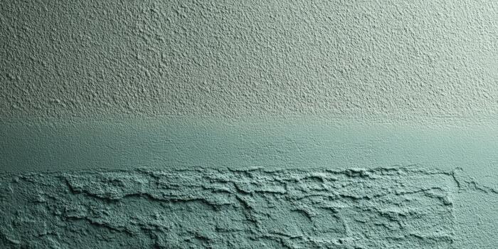 Textured wall in soft green and muted tones photo