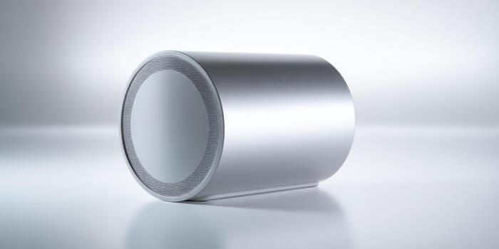 Modern sleek design of a futuristic speaker on a plain background photo