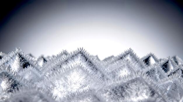 Geometric ice crystals with sharp spiked pyramid shapes photo