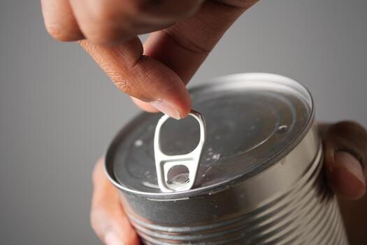 Open a can with ease using a simple pull tab method photo