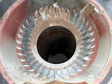A close up of a turbine with a large hole photo